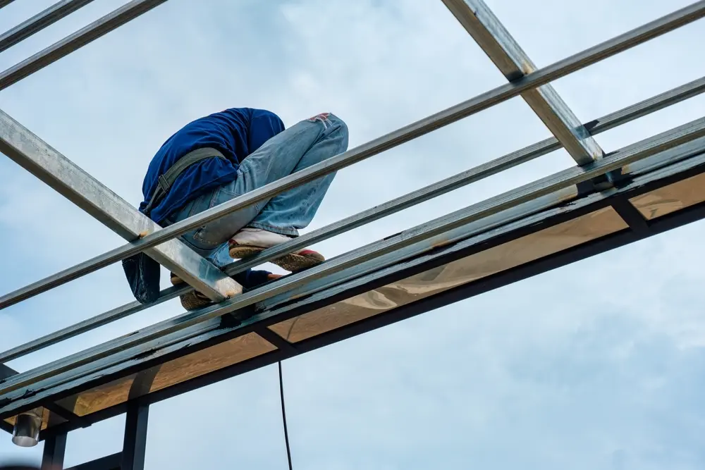 In-house framing crew matching roofline and stucco on a Scottsdale home addition