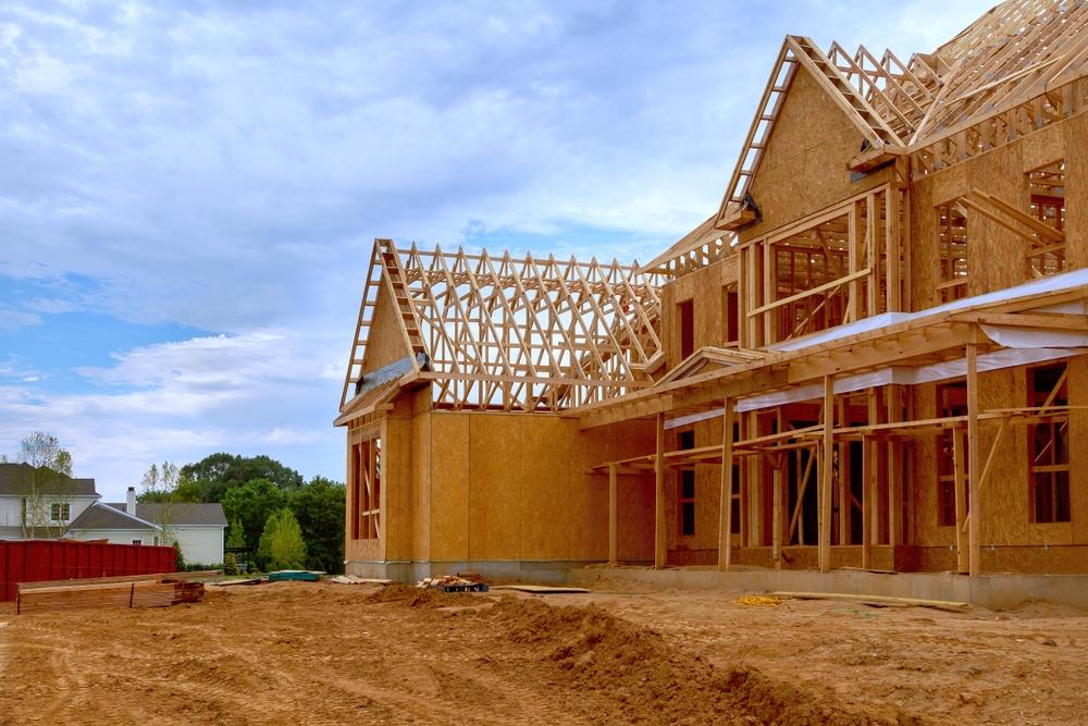 Home addition contractor framing a room expansion in Phoenix, AZ